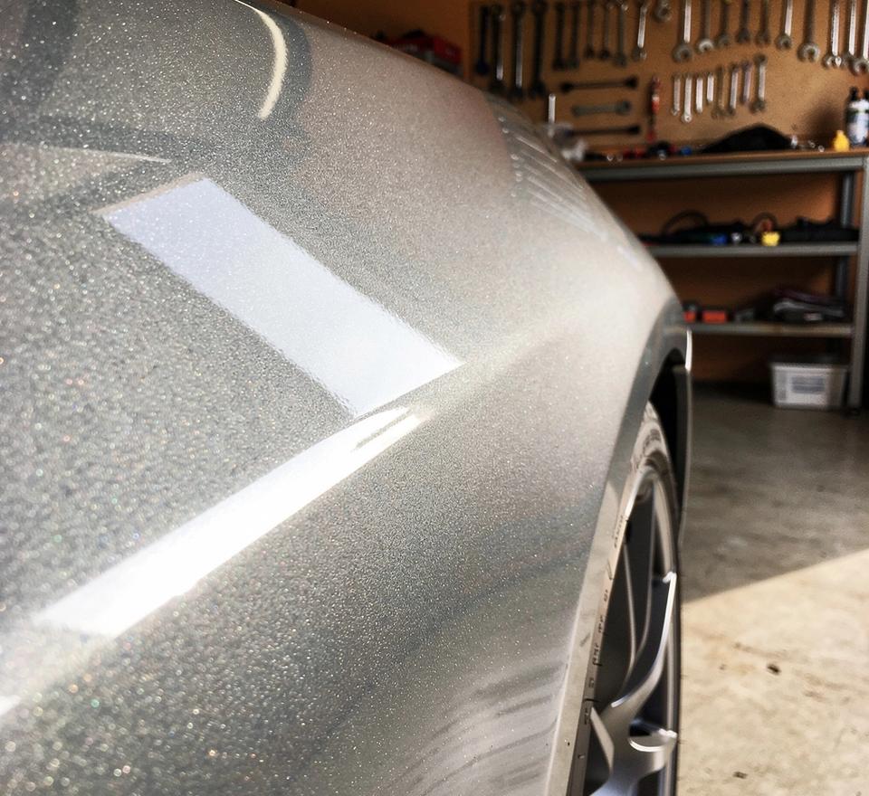 Enhance: controlled reflections and deeper tone under clean daylight.